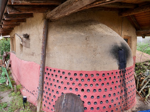 Traditional oven for bread baking with clay walls.