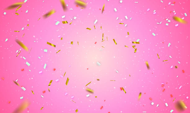 istock Golden and colorful confetti sparkles on pink background 1486298033