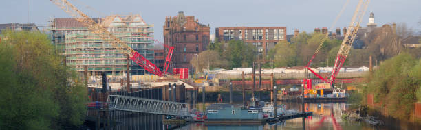 New Partick bridge being built to link Govan over the River Clyde Glasgow, UK, April 23rd 2023, New Partick bridge being built to link Govan over the River Clyde panoramic riverbank architecture construction site stock pictures, royalty-free photos & images