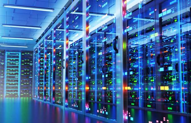 istock Interior of Big Modern server room with rows of rack cabinets, data centre or mining farm interior with beautiful neon lights reflections. 1486318910