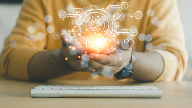 istock Man holding global network and brain icons with the idea of e-learning technology, online courses. 1486319461