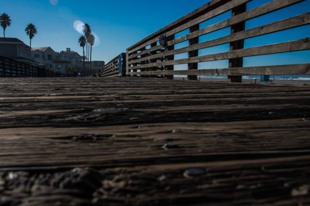 Pismo Beach, California coastline and beach.  Looking back on the coastline from the end of the pier. Also photos of small waves rolling onto the beach.