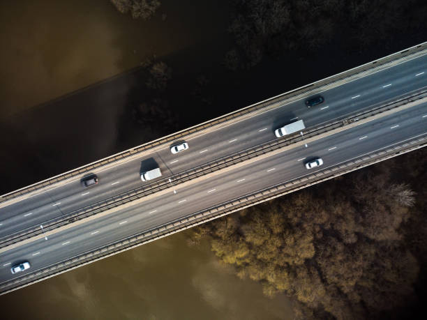 A road bridge over the river, taken from a quadrocopter. stock photo