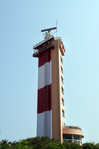 Low angle view of Light house against clear sky background.