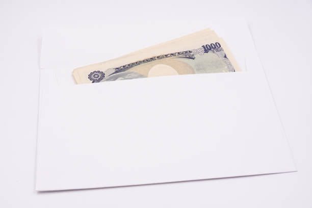 istock Japanese one thousand yen notes in a white envelope 1486335080