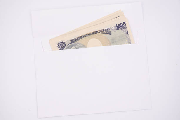 istock Japanese one thousand yen notes in a white envelope 1486335357