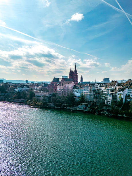 Aerial view of Basel over the Rhine River. Historic buildings in view.