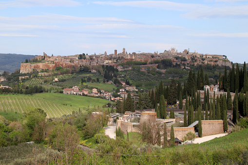 Orvieto, Province of Terni, Umbria, Italy - 23 april 2023: Panorama on the cliff of Orvieto. The Torre del Moro, the Cathedral and the historic center are visible.