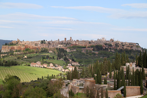 Orvieto, Province of Terni, Umbria, Italy - 23 april 2023: Panorama on the cliff of Orvieto. The Torre del Moro, the Cathedral and the historic center are visible.
