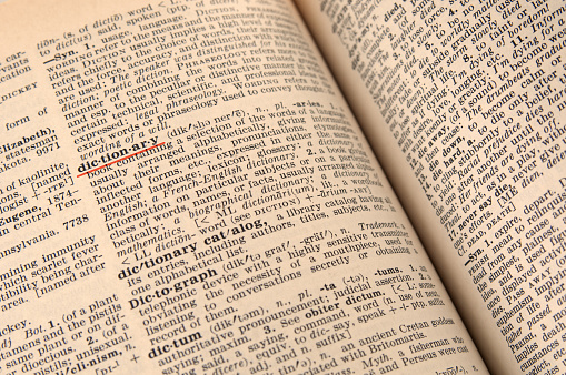 Dictionary page close up with underlined word
