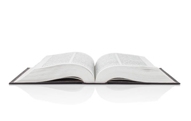 istock Open book  close up isolated on a white background 1486348325