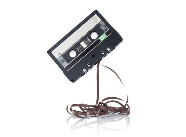 istock Old vintage audio cassette close up isolated on white background 1486348516