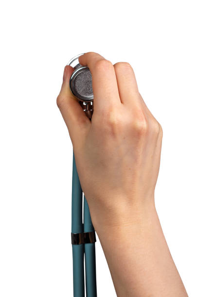 istock Hand holding stethoscope isolated on white 1486350659