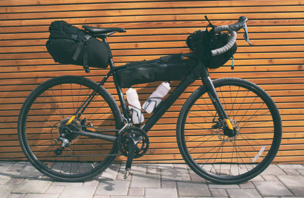 The bicycle packed with a lot of bags and other equipment ready for adventure and travel stock photo