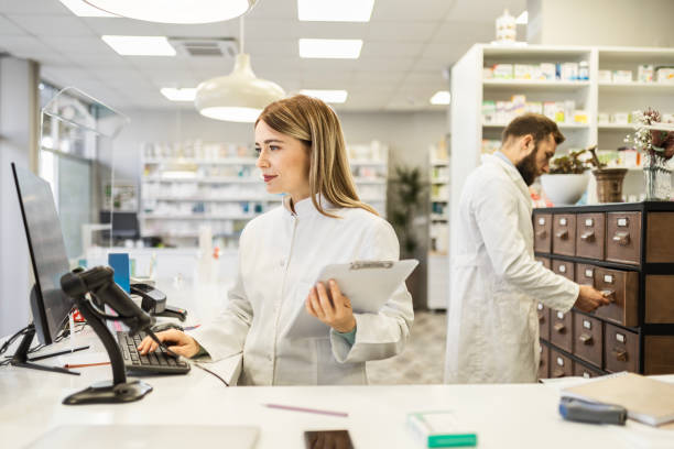istock Pharmacist working in drugstore 1486357809