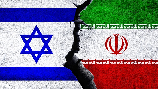 Iran and Israel flags together on a cracked. Iran and Israel relations.