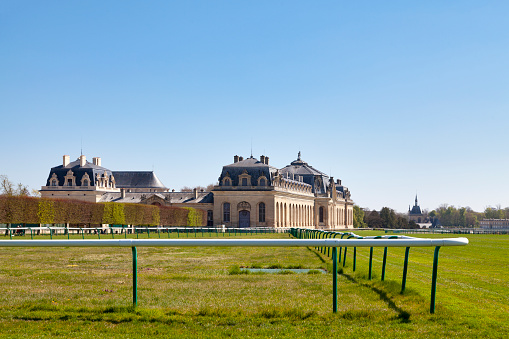 Chantilly, France - April 25 2021: The Great Stables, home of the Living Museum of the Horse (French: Musée Vivant du Cheval).