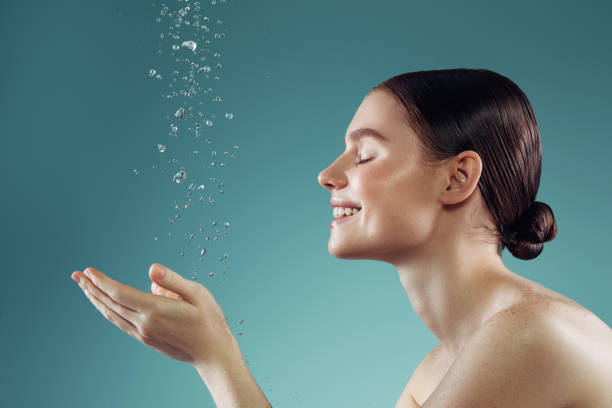 Girl washes her face