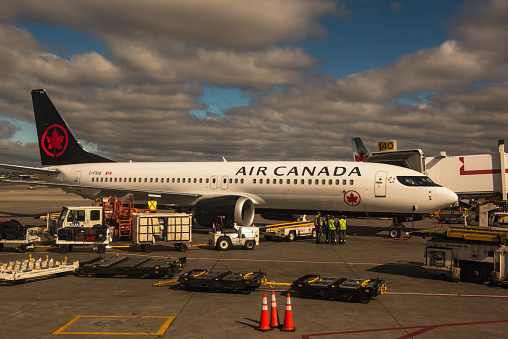 An airplane of Air Canada is parking at Pearson International airport of GTA, Ontario, Canada.