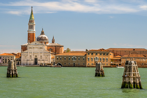 A Gondola crossing the Venetian Lagoon.