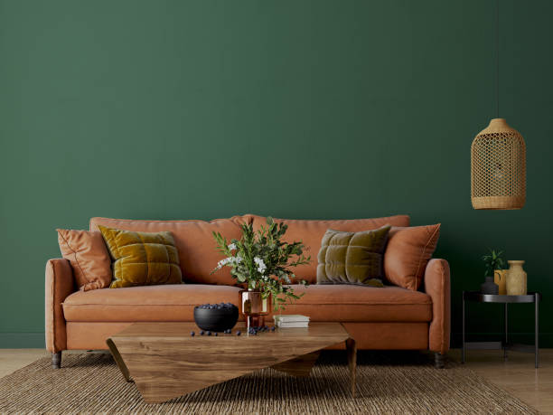 istock Green living room with orange sofa and table.3d rendering 1486391726