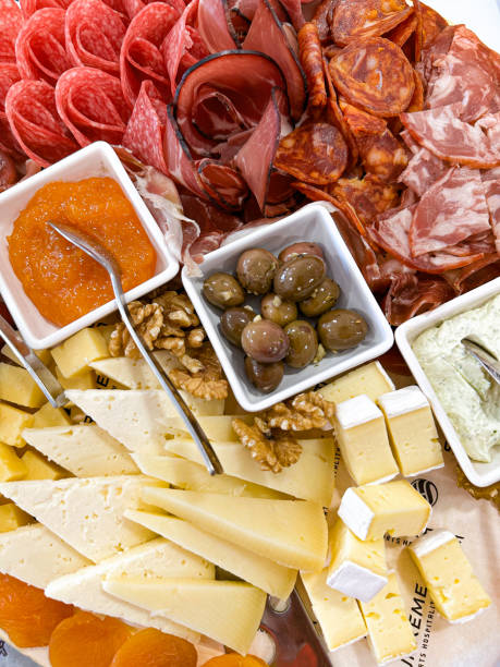 istock Cheese platter with different sorts of Cheese and ham with jam 1486399059