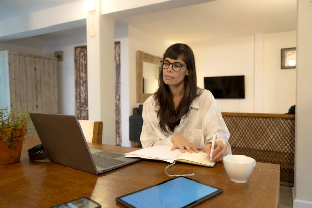 istock woman in front of laptop 1486402511