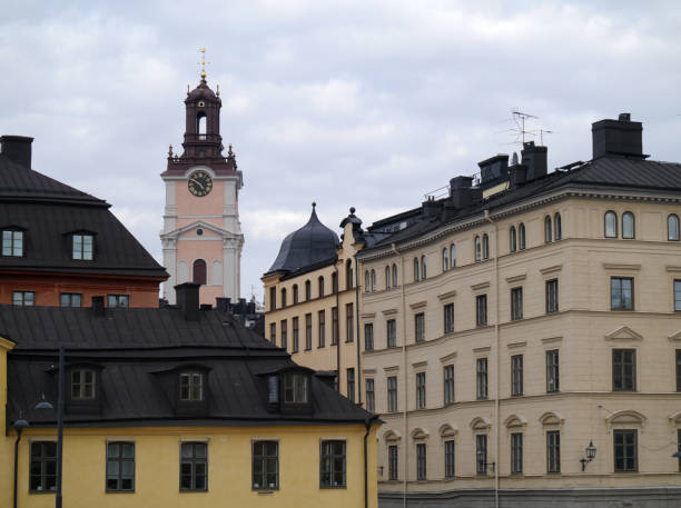 istock Low angle view of buildings against sky 1486404117
