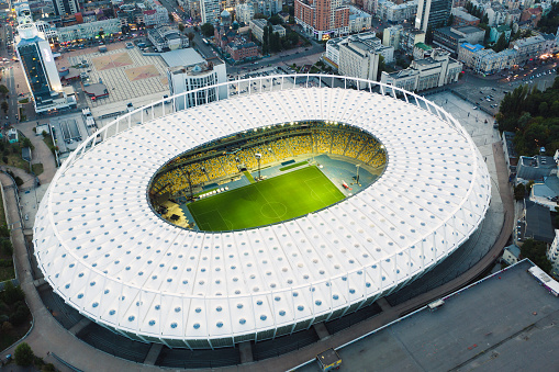 Aerial top view of Center of Kyiv Оlimpiyskiy Stadium NSC Ukraine August 17, 2021, Drone aerial view cityscape. Stadium national sports complex, Olimpiysky National Sports Complex, and the district around