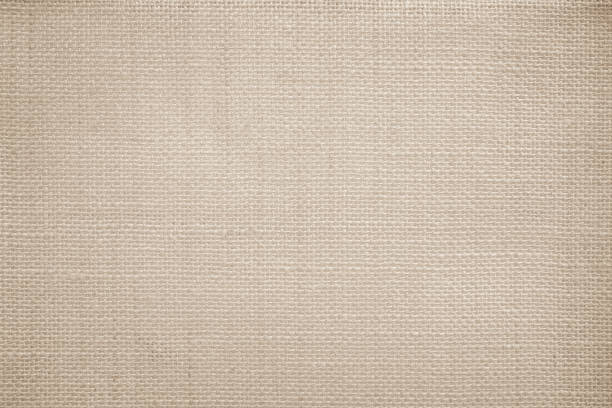 istock Detailed woven fabric texture background mesh pattern light beige color blank. Jute hessian sackcloth burlap canvas Natural weaving fiber linen and cotton cloth texture as clean empty for decoration. 1486414218