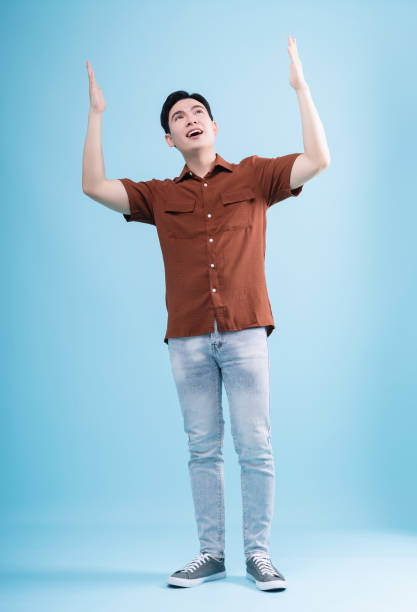 istock Image of young Asian man on background 1486422595