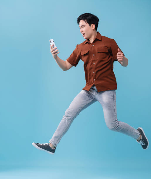 istock Image of young Asian man on background 1486422637