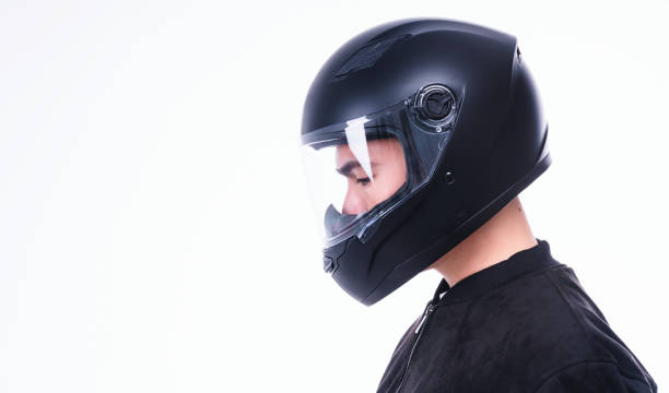 istock Image of young Asian man with helmet on background 1486422764