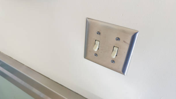 istock The light switch, turned on or off, is a simple but powerful symbol of control over light and darkness, illumination and obscurity, clarity and mystery 1486429918