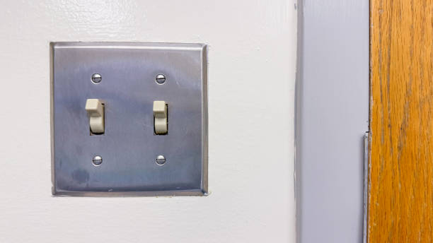 istock The light switch, turned on or off, is a simple but powerful symbol of control over light and darkness, illumination and obscurity, clarity and mystery 1486430157