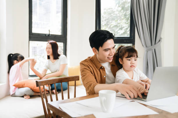 istock Young Asian family at home 1486433414