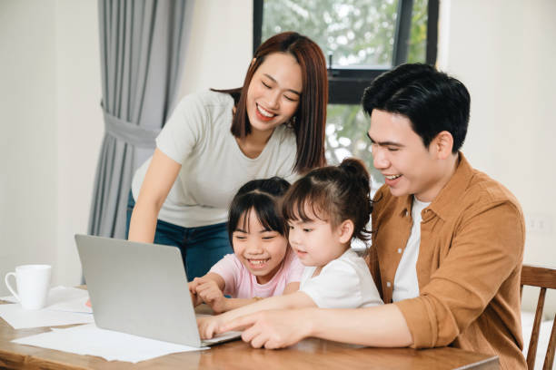 istock Young Asian family at home 1486433426