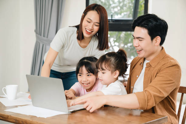 istock Young Asian family at home 1486433430