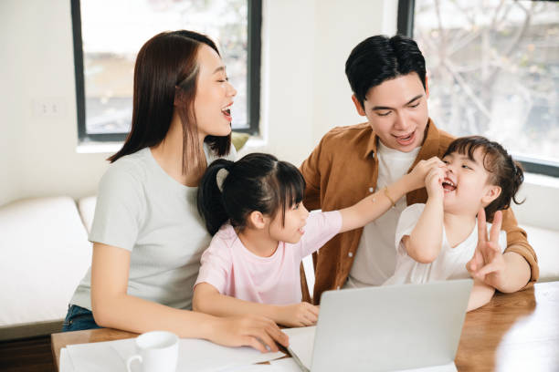 istock Young Asian family at home 1486433434