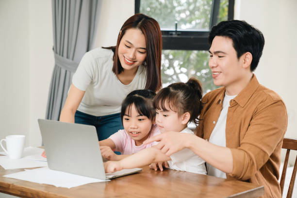 istock Young Asian family at home 1486433439