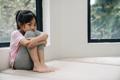 Image of Asian child at home