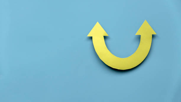 istock Yellow arrow pathway sign choices. Future life with different direction symbol. Business success concept.Banner with copy space. 1486435341