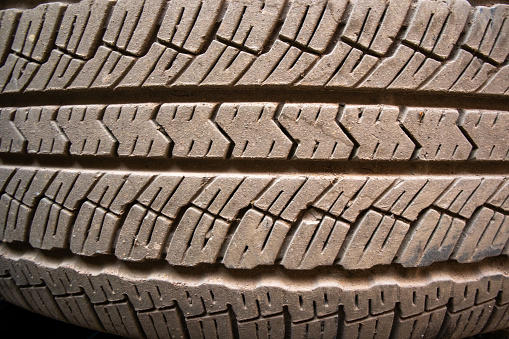 Close-up view of worn out or no longer used tires.