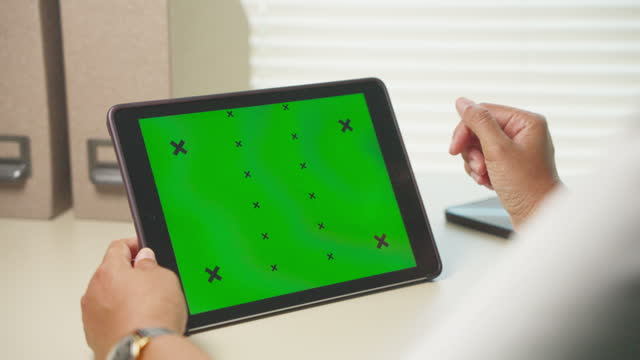 Close-up Digital Tablet with Green Screen