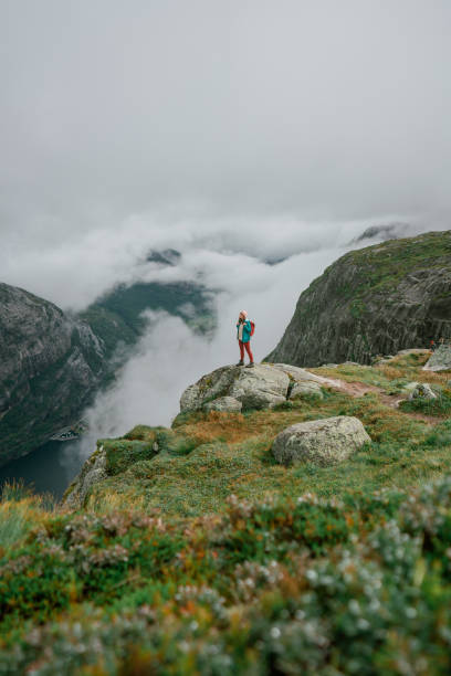 istock Woman hiking in mountains  in Norway 1486449416