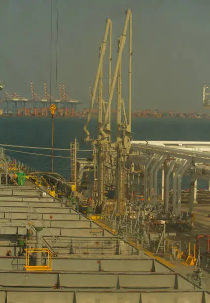 Photo of Cargo operation in progress in a ship at port