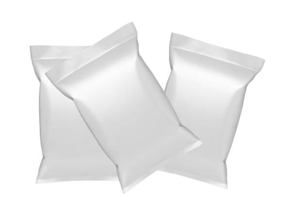 istock Empty white plastic and silver metallic foil envelopes for packaging design. isolated on white background 1486458512