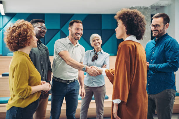 istock Businessman congratulating a colleague 1486461199