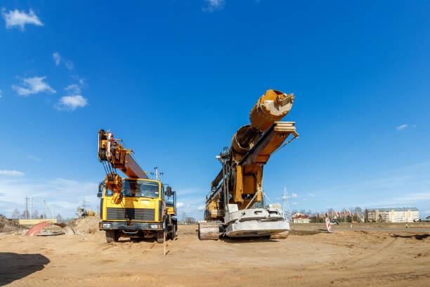 istock The construction site for the highway with heavy equipment. Two rotational exercises, lifting crane 1486470392