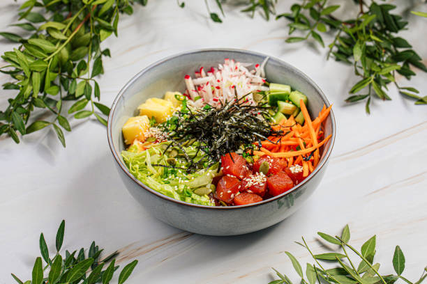 istock Portion of tuna poke bowl with vegetables 1486470809